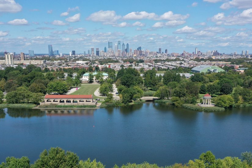 Aerial view of Edgewood Lake in FDR Park, with Philadelphia skyline in the background.